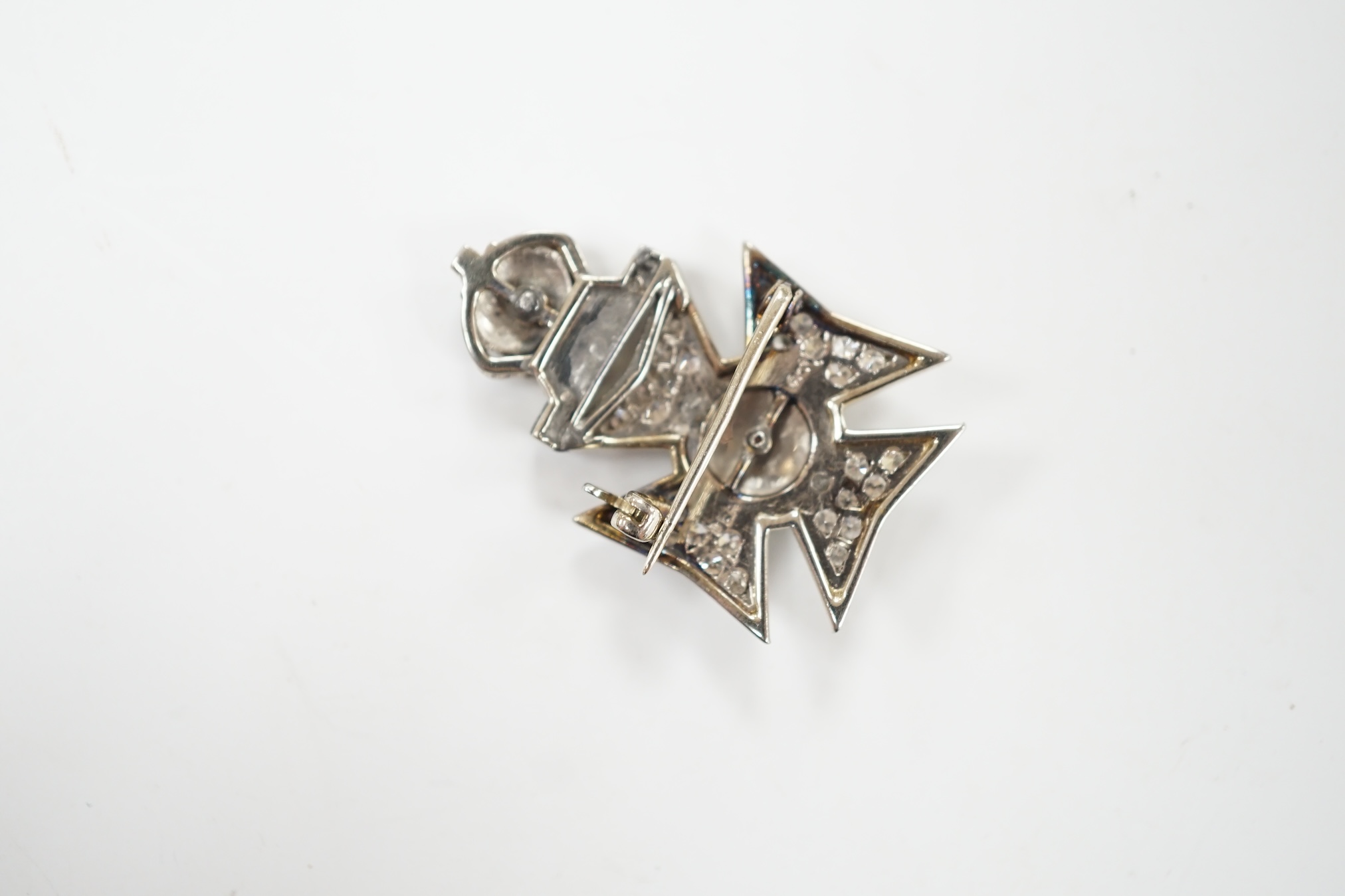An early to mid 20th century 18ct and plat. enamel and diamond cluster set The King's Royal Rifle Corps sweethearts brooch, 30mm, gross weight 7.8 grams. Condition - good